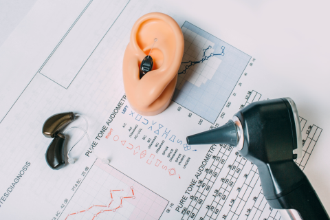 Audiogram with hearing aid and otoscope